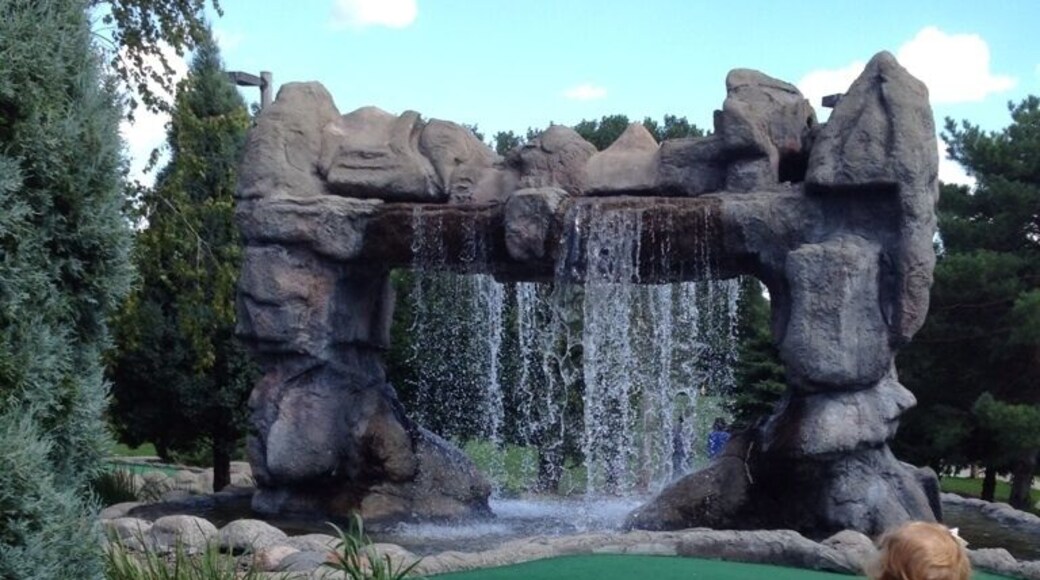 $7.25 adults, under $6 for kiddos and seniors. 18 holes with some handicap accessible. Good family fun!!