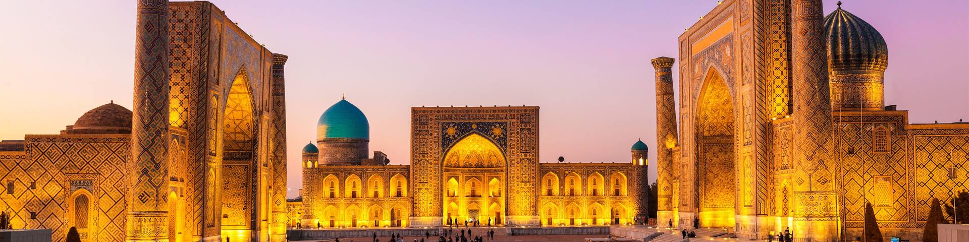 View of Registan square in Samarkand - the main square with Ulugbek madrasah, Sherdor madrasah and Tillya-Kari madrasah at sunset. Uzbekistan