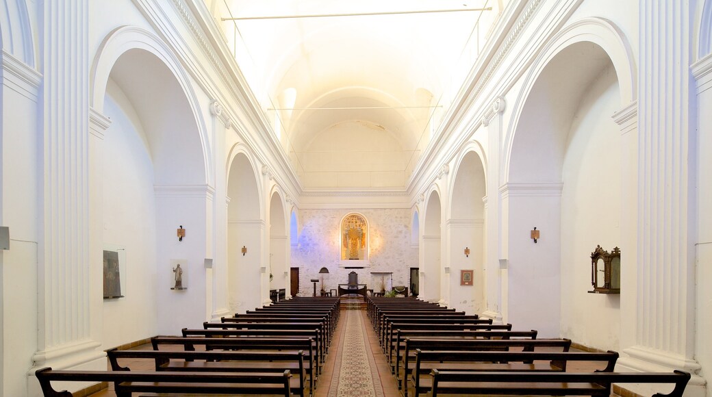 Colonia del Sacramento featuring interior views, a church or cathedral and religious aspects