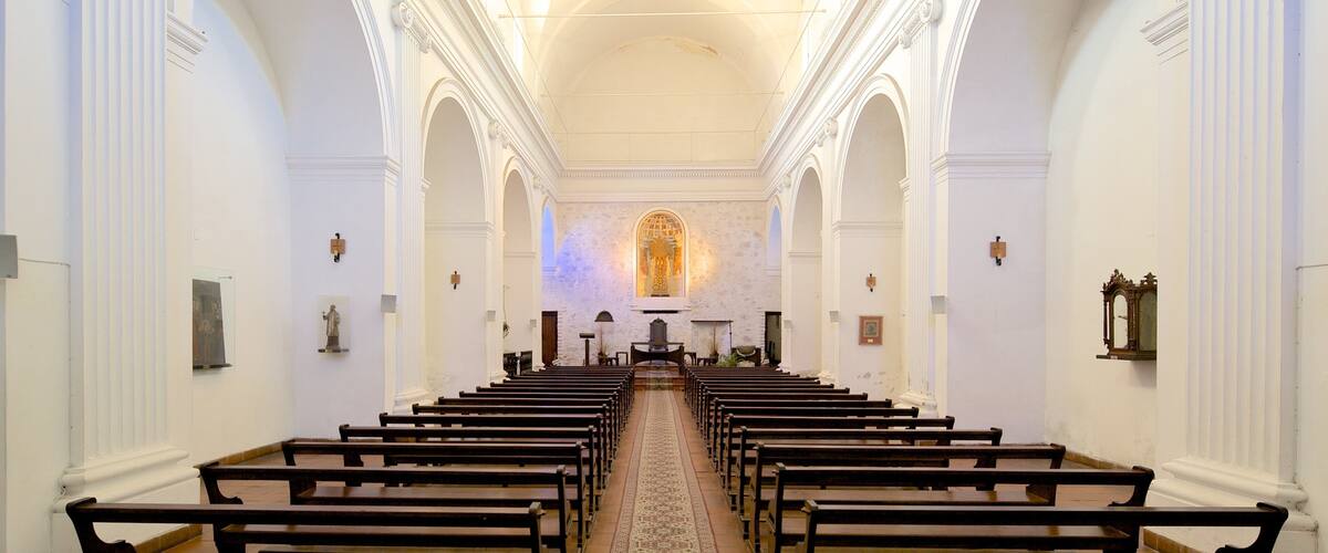Colonia del Sacramento featuring religious elements, a church or cathedral and interior views
