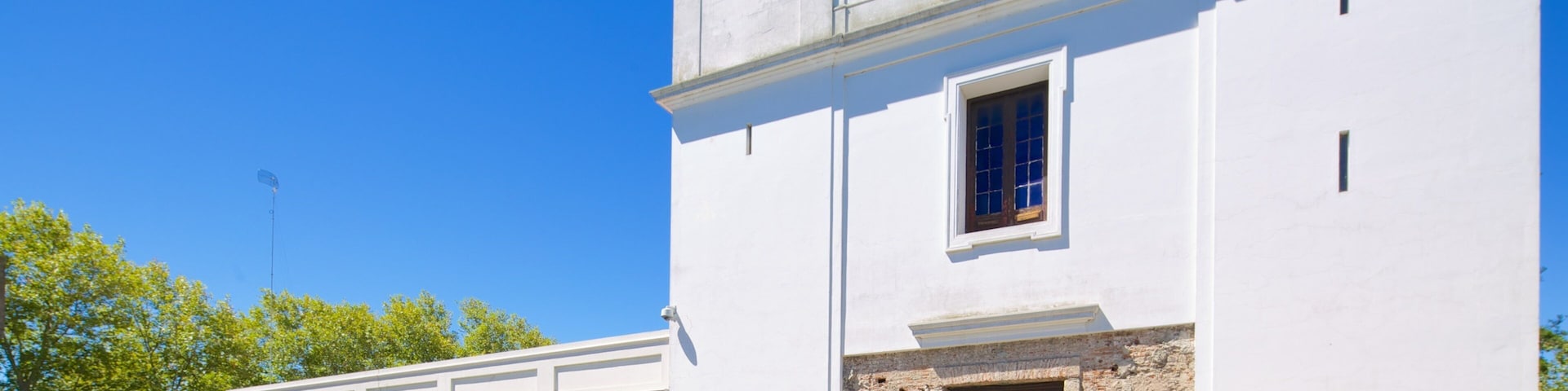 Matriz Church featuring heritage architecture, a small town or village and street scenes