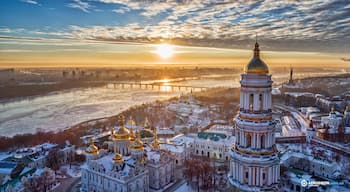 Orange sunset and cloud over cityscape Kiev, Ukraine, Europe