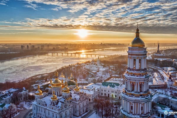 Orange sunset and cloud over cityscape Kiev, Ukraine, Europe