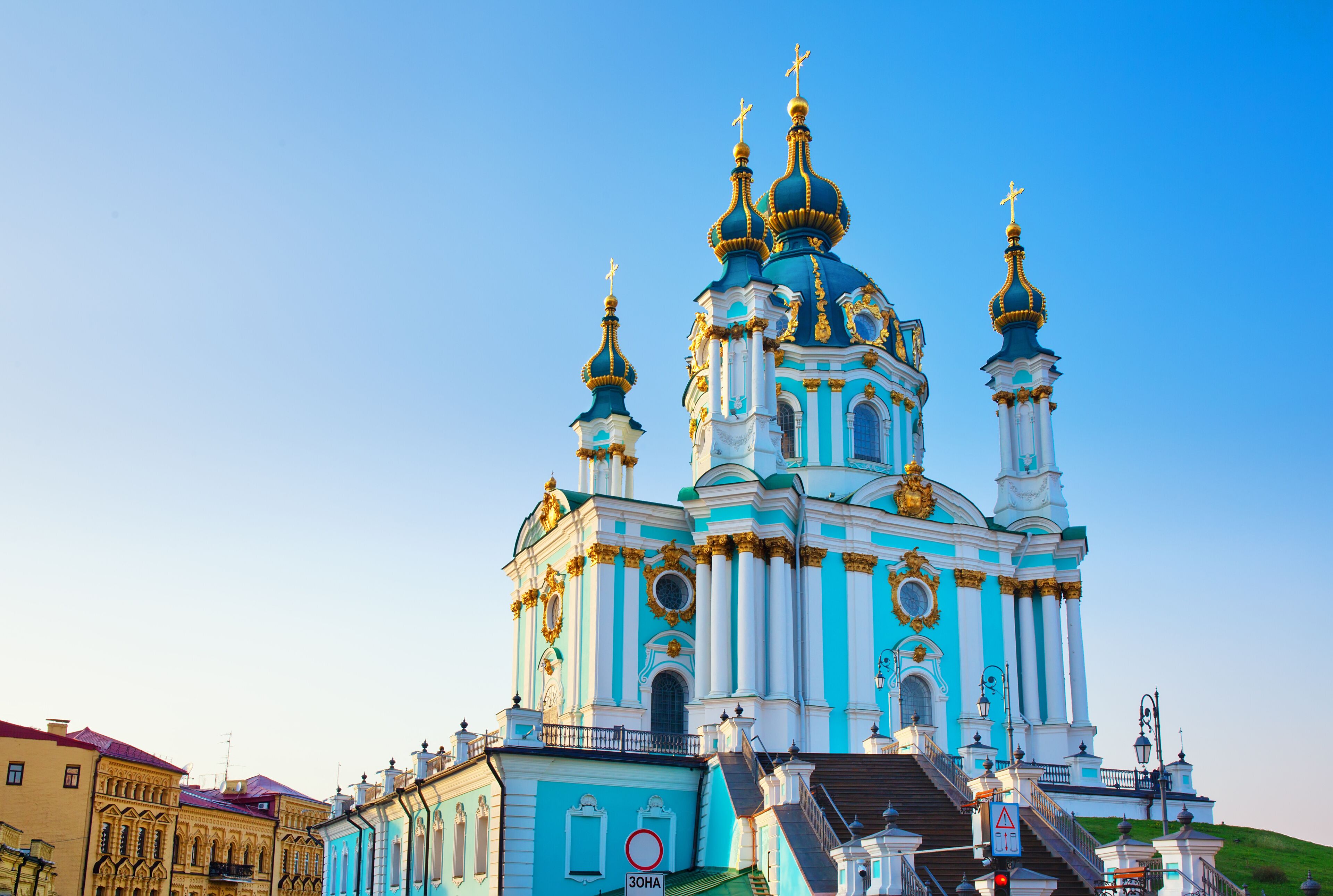 View to Andriivska church, Andriivsky descent and historic buildings in the center of Kyiv, Ukraine