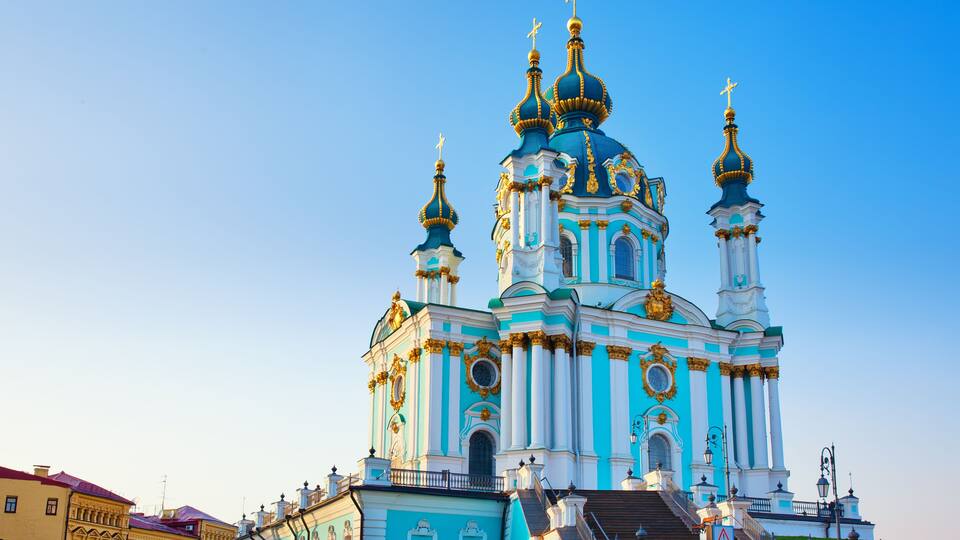 View to Andriivska church, Andriivsky descent and historic buildings in the center of Kyiv, Ukraine