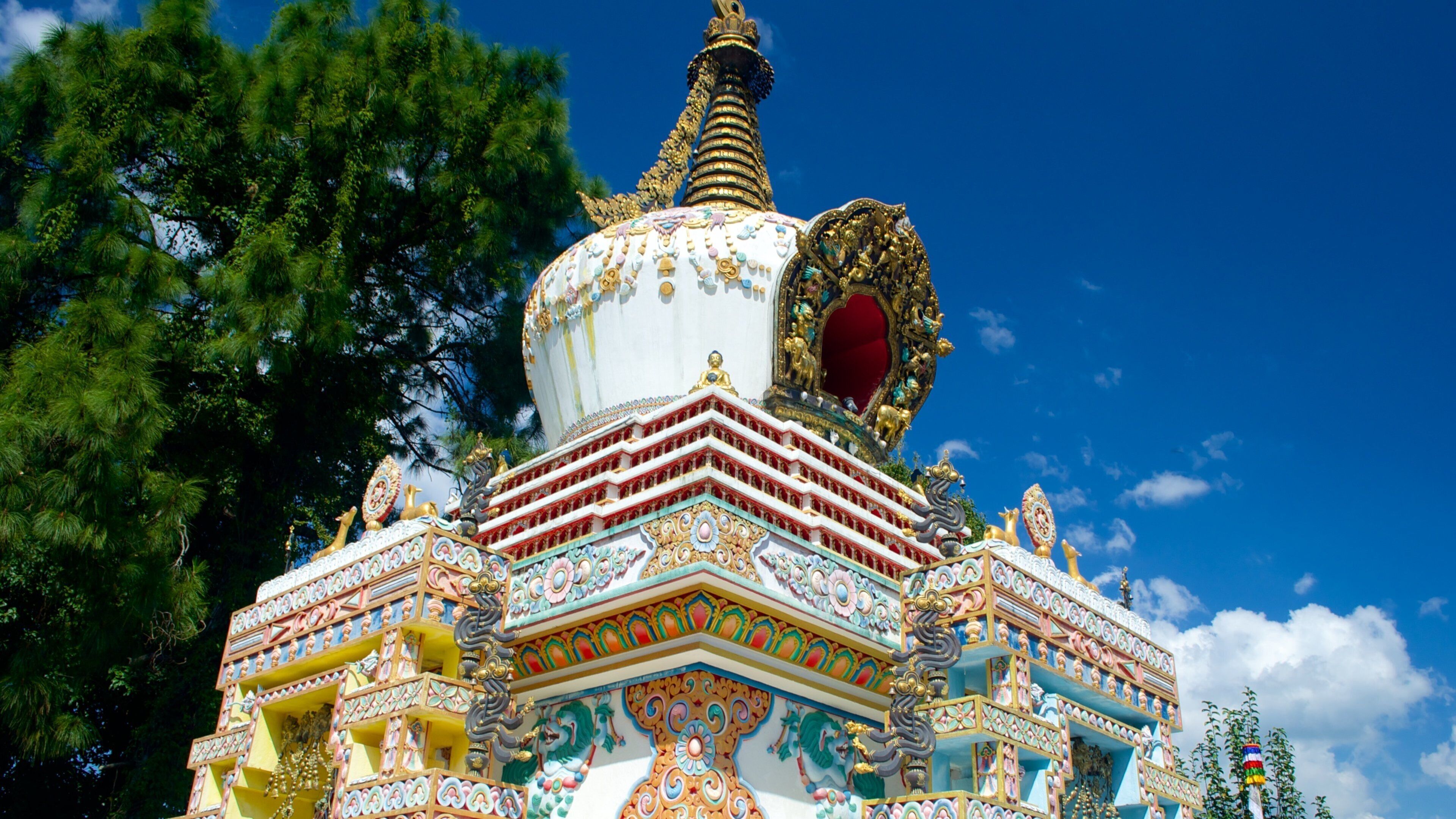 Kopan Monastery which includes heritage elements, religious elements and a statue or sculpture