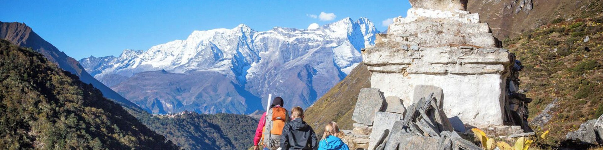 Trekking to Everest Base Camp. Actually, in this photo, we are trekking back to Lukla. Off in the distance, sitting on the ridge, is the town of Tengboche. #kids #hiking #adventure #trekking
For more amazing photos, check out this post: http://www.earthtrekkers.com/everest-base-camp-trek-in-18-amazing-photos/