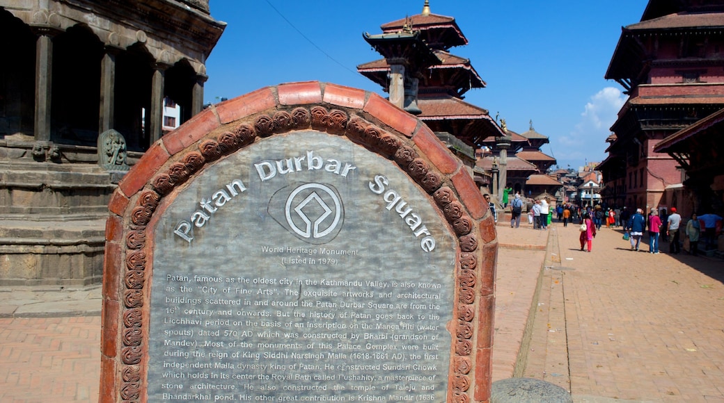 Patan Durbar Square featuring signage