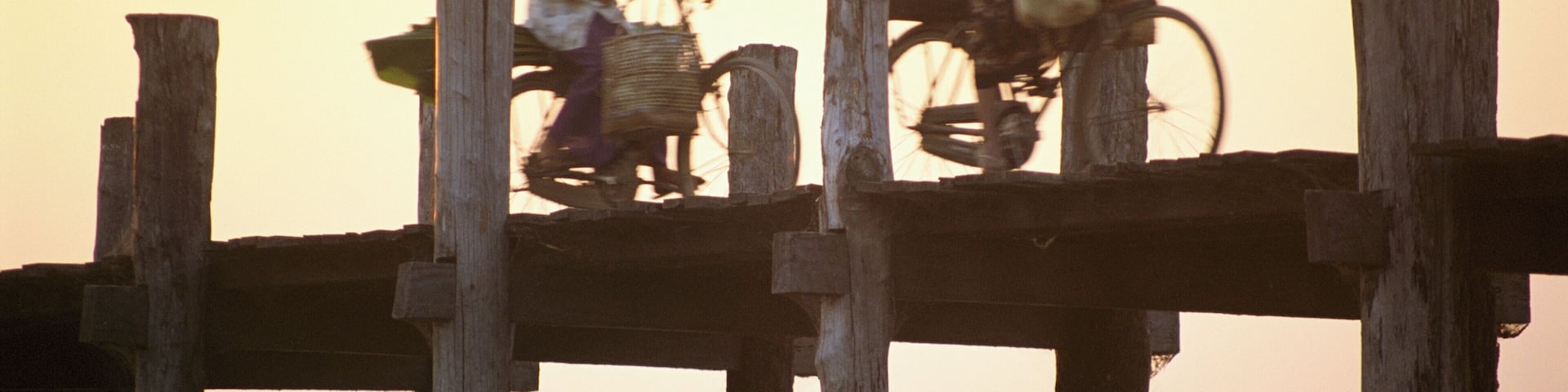 Two People Cycling on Ubein Bridge, Mandalay, Myanmar