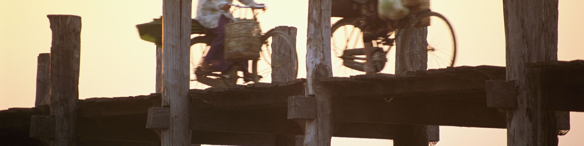 Two People Cycling on Ubein Bridge, Mandalay, Myanmar