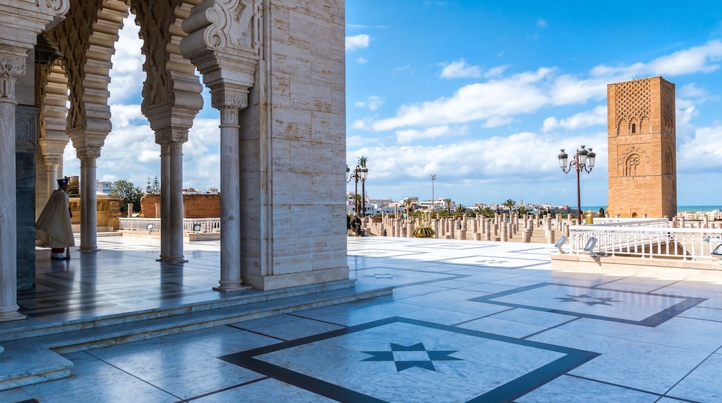 RABAT, MOROCCO - MARCH 20, 2018: Beautiful Mausoleum of Mohammed V and square with Hassan tower in Rabat on sunny day. March 20, 2018 in Rabat, Morocco