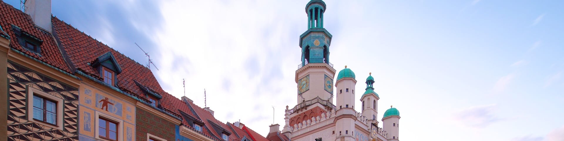 Poznan Town Hall which includes heritage elements and a square or plaza