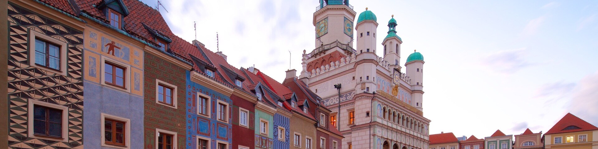 Poznan Town Hall which includes heritage elements and a square or plaza
