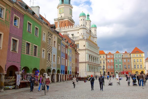 Poznan Town Hall featuring a square or plaza and street scenes
