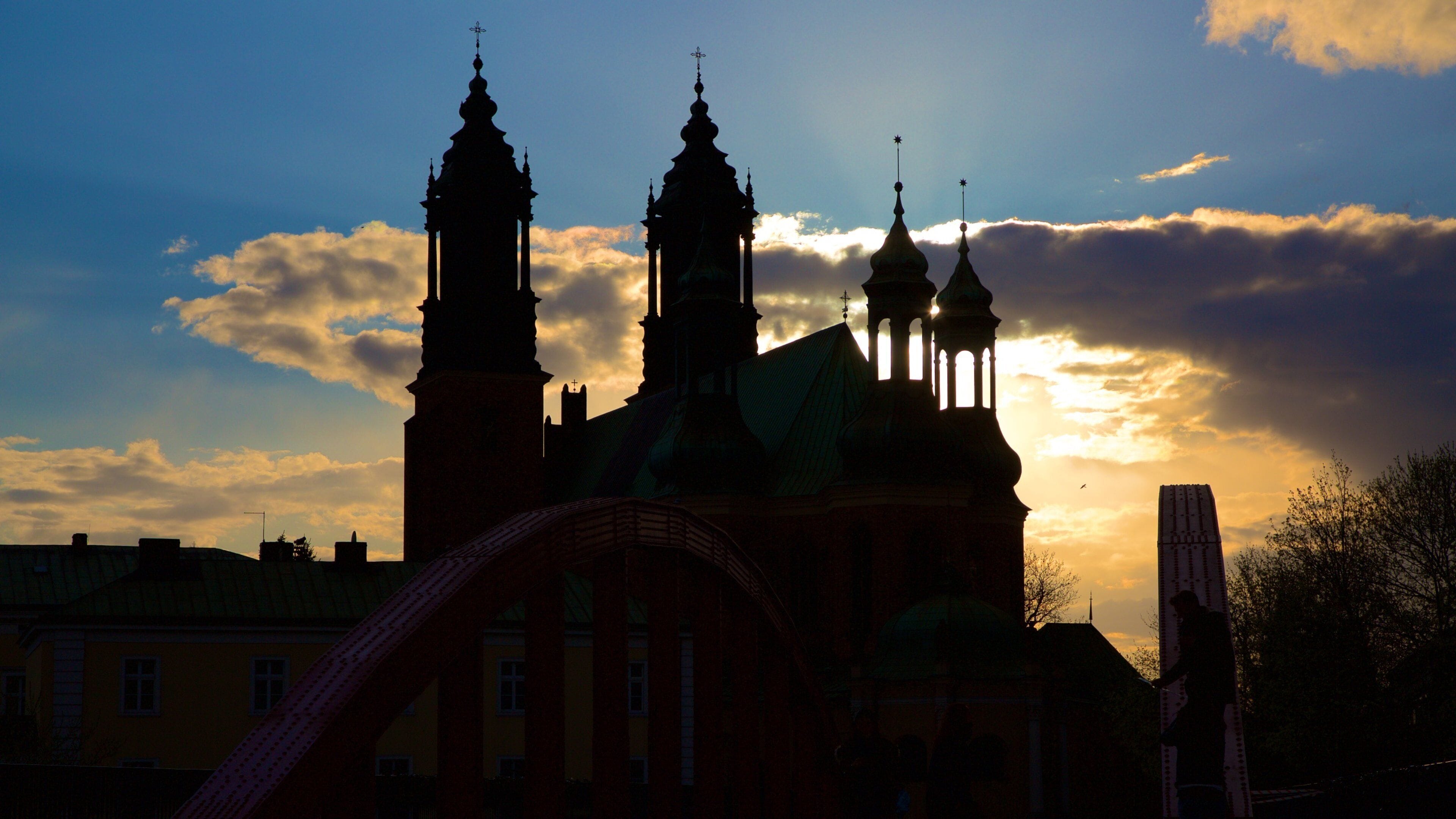 Archcathedral Basilica of St. Peter and St. Paul featuring a sunset and heritage architecture