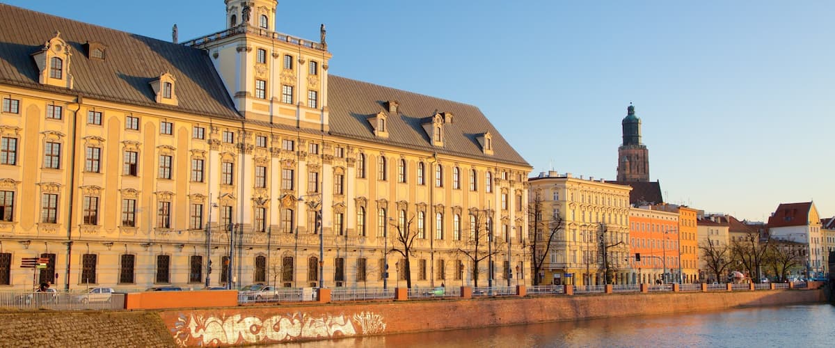 Wroclaw University featuring a river or creek and heritage architecture