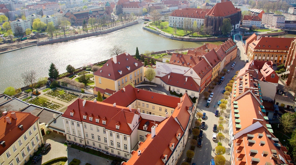 Wroclaw Cathedral which includes a river or creek and a city