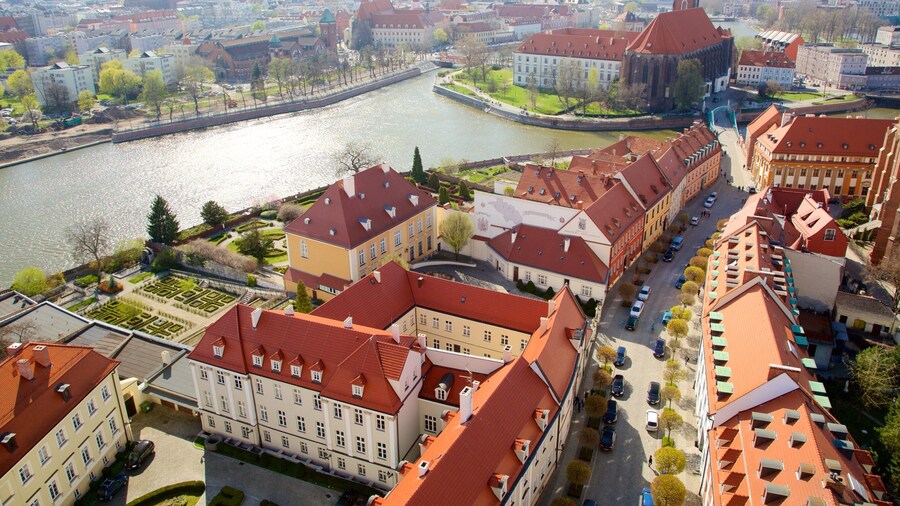Wroclaw Cathedral which includes a river or creek and a city