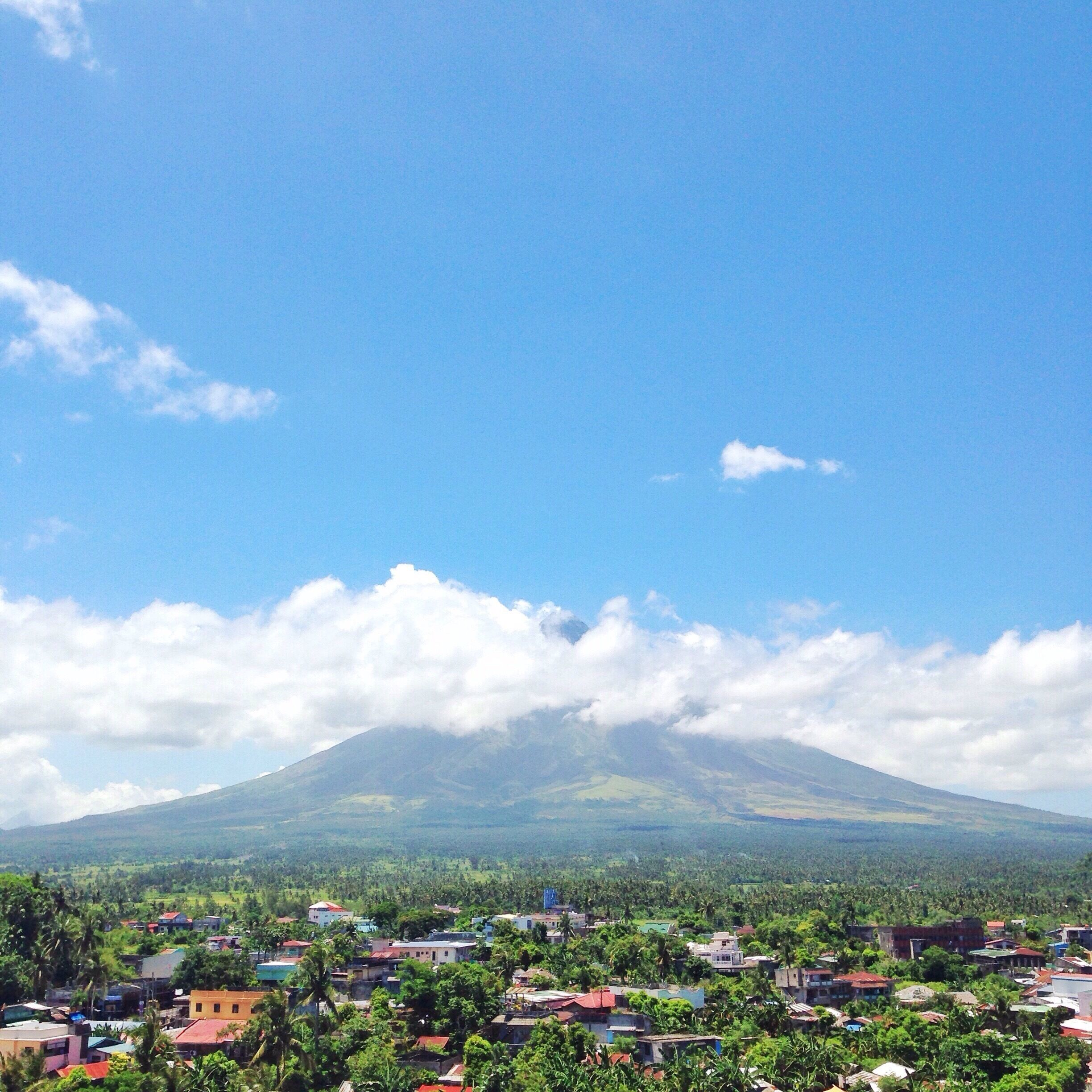 The world famous perfect cone shaped Mayon Volcano of Albay as seen from Daraga Church. I am not that lucky to witness its full beauty, according to locals, the best time to view its full glory is early in the morning. You could try ATV adventure to get near to the Mayon Skyline. #Blue #BestOf5