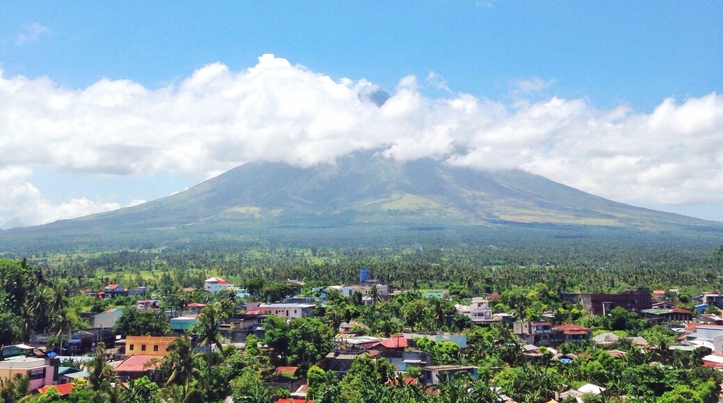 The world famous perfect cone shaped Mayon Volcano of Albay as seen from Daraga Church. I am not that lucky to witness its full beauty, according to locals, the best time to view its full glory is early in the morning. You could try ATV adventure to get near to the Mayon Skyline. #Blue #BestOf5