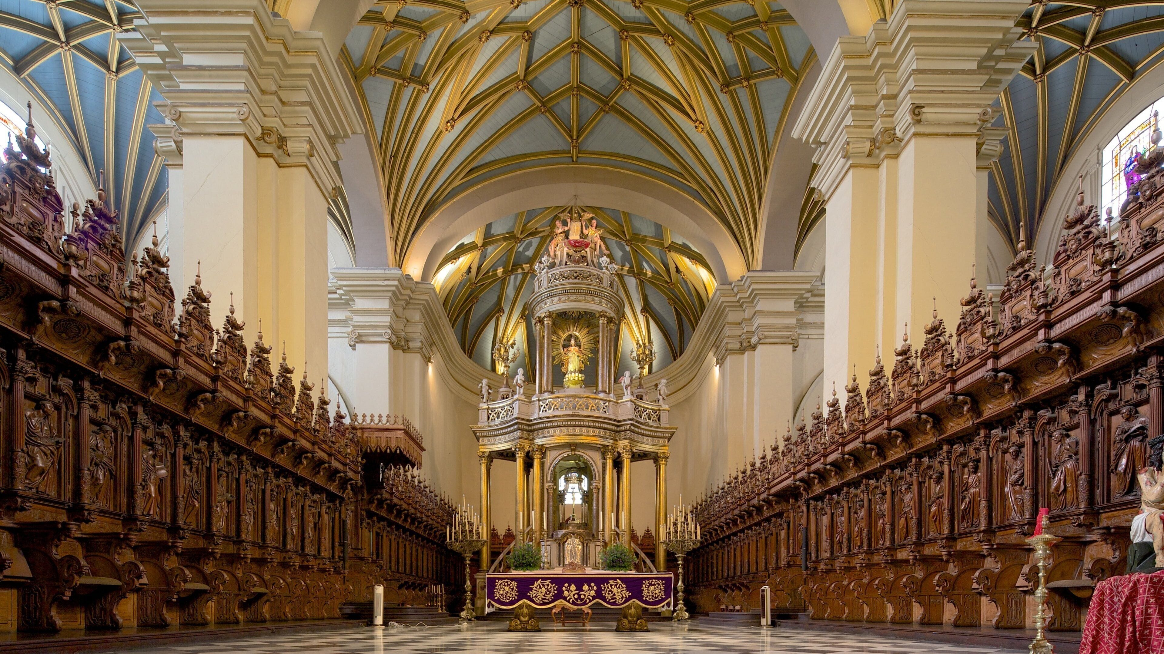Plaza Mayor featuring a church or cathedral, interior views and religious aspects