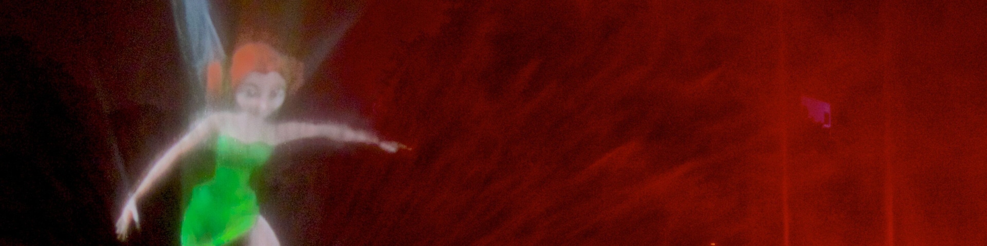 Exposition Park showing a fountain, night scenes and outdoor art