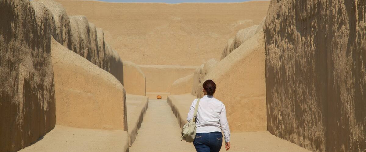 Chan Chan which includes hiking or walking, heritage elements and building ruins