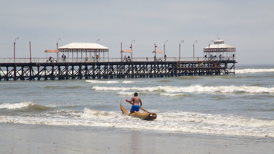 Huanchaco Beach showing a beach as well as an individual male