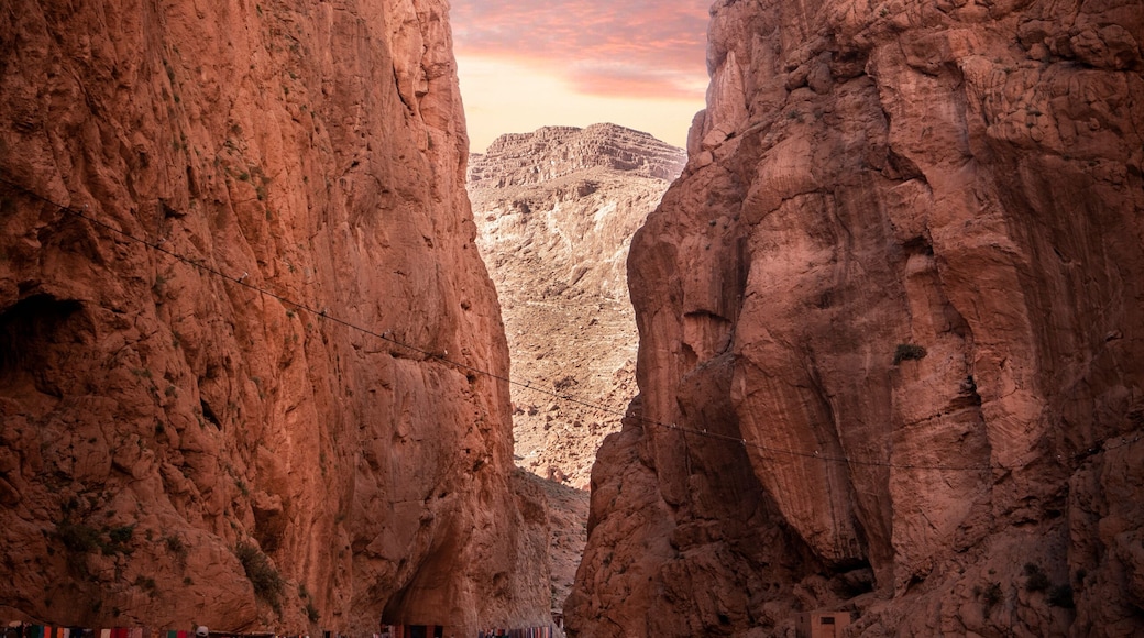 Todgha Gorge or Gorges du Toudra is a canyon in High Atlas Mountains near the town of Tinerhir, Morocco . A series of limestone river canyons, or wadi and neighbor of Dades Rivers at sunset