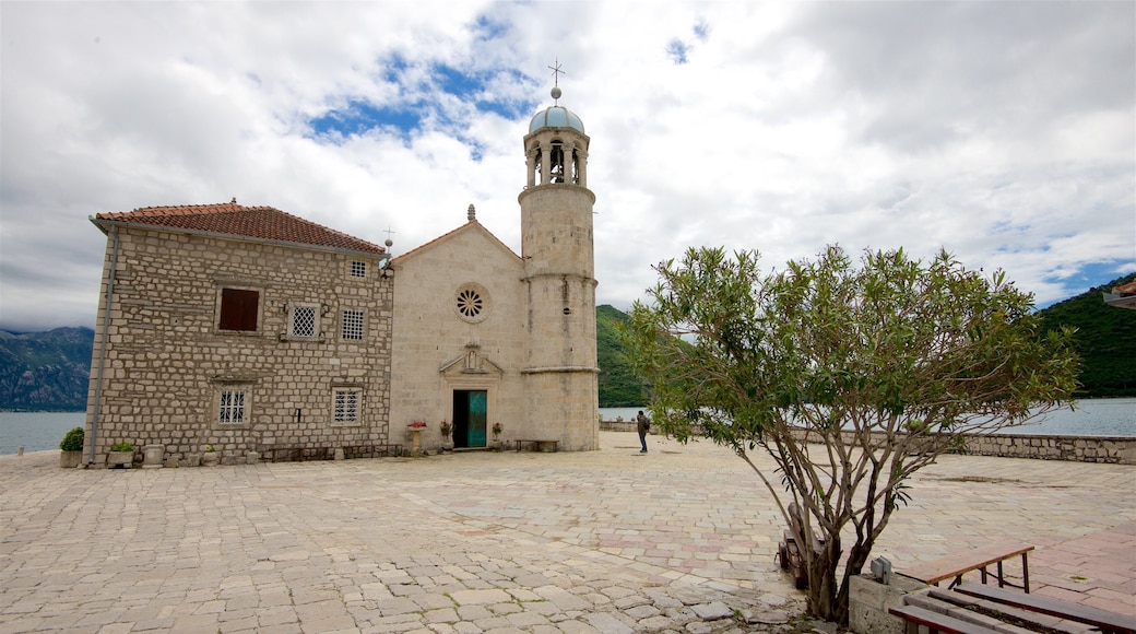 Our Lady of the Rocks featuring a church or cathedral and general coastal views