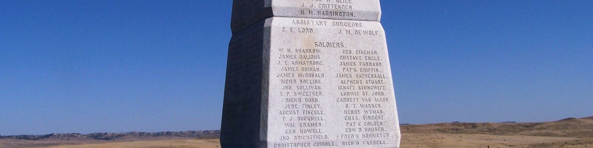 A memorial monument listing names of officers, lieutenants, and soldiers.
