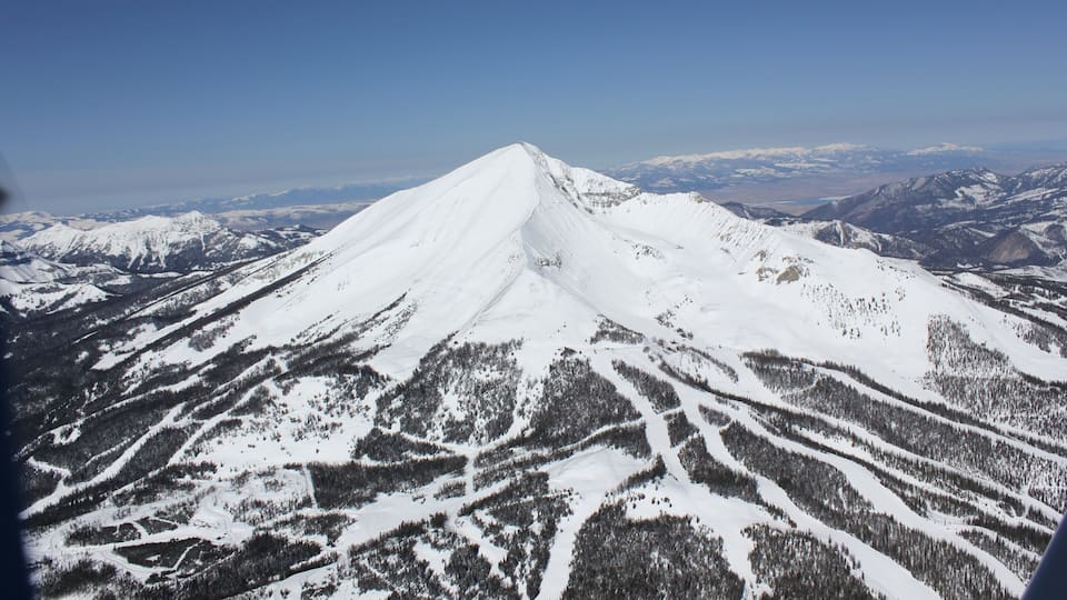 Big Sky Resort featuring mountains, snow and landscape views
