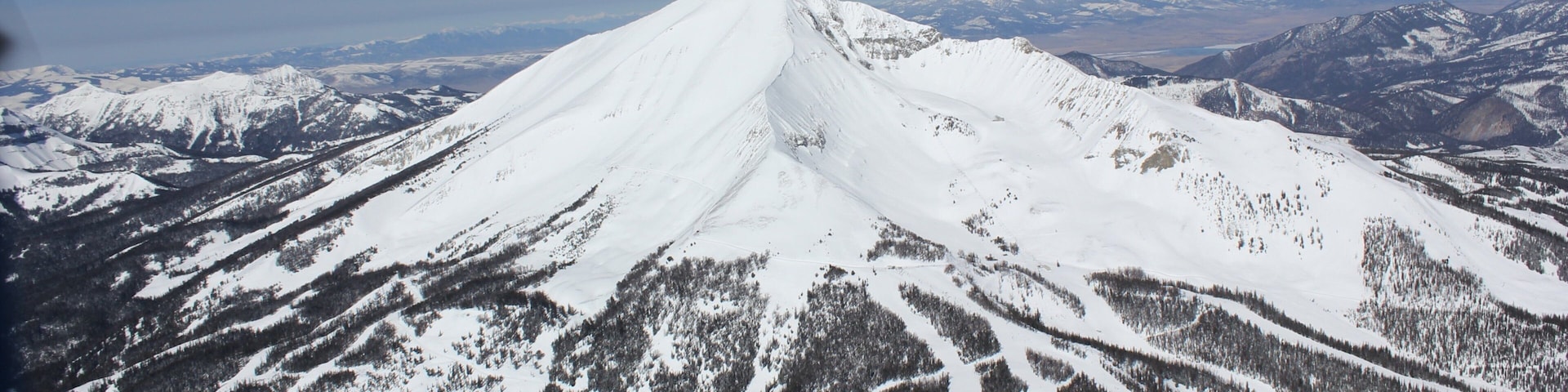 Big Sky Resort featuring mountains, snow and landscape views