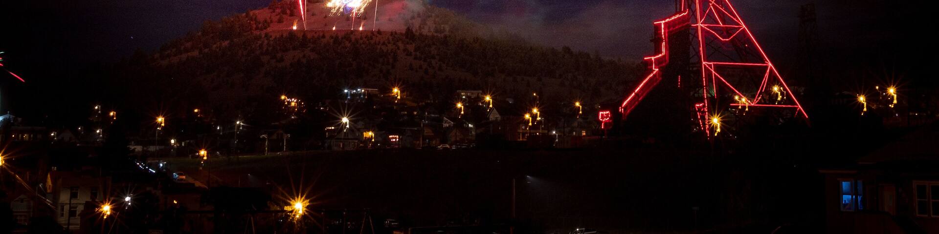 Butte Montana on the 3rd or 4th of July. Fireworks being shot over Montana Tech.