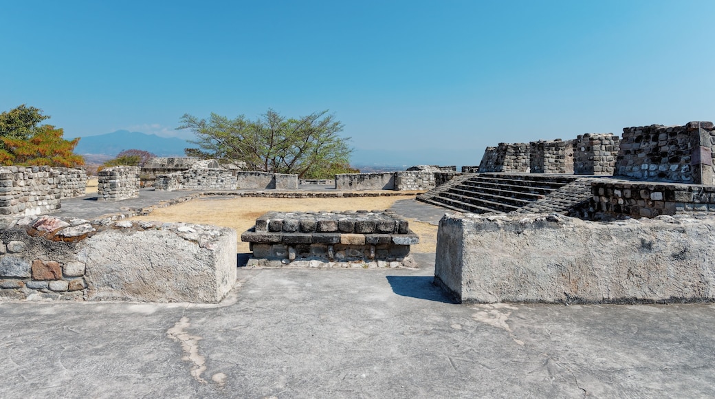 Top view of the area and the ruined ancient step pyramids on top of the mountain, buildings and masonry, architecture. City in Mexico Xochicalco