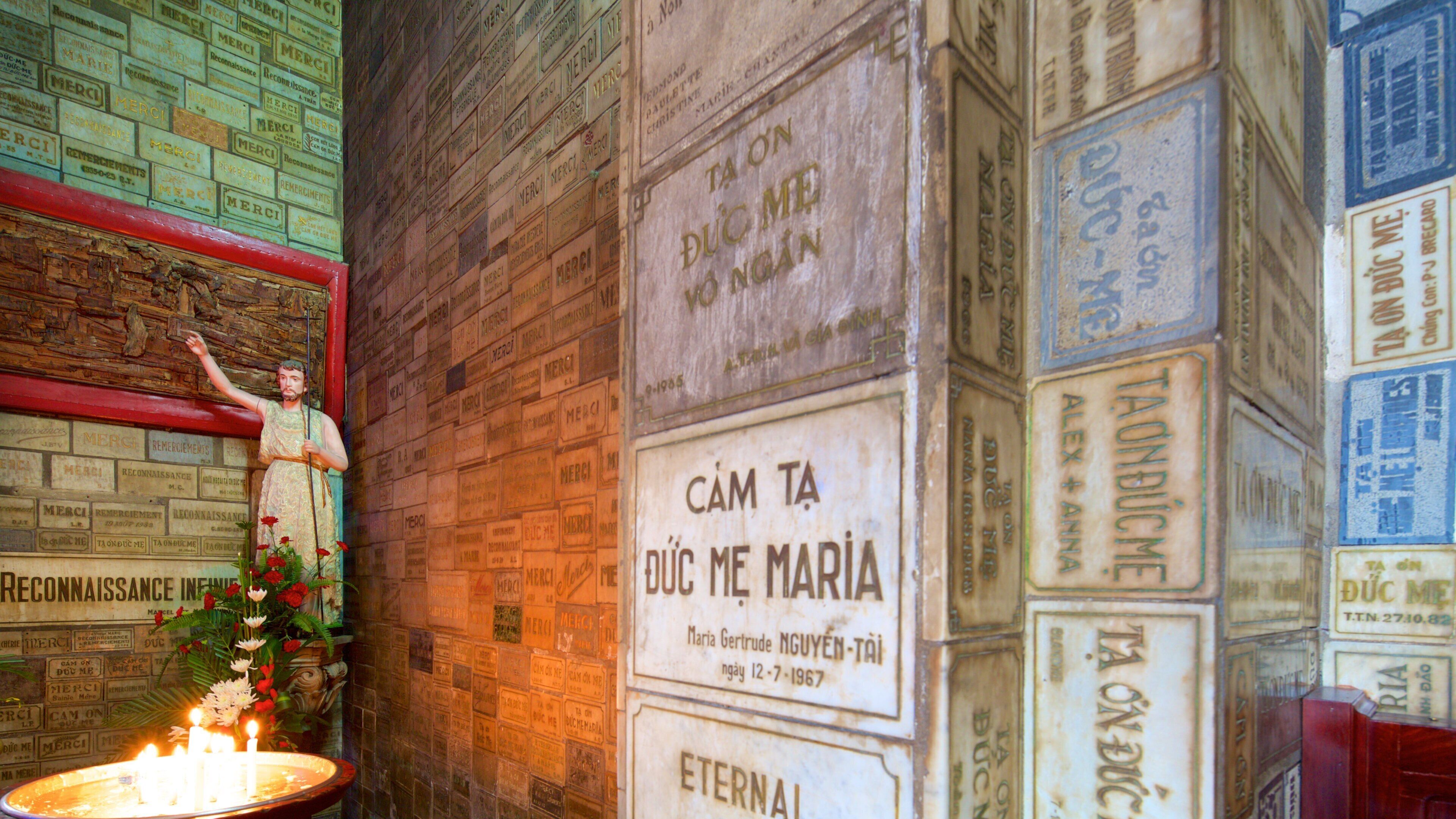 Saigon Notre-Dame Basilica which includes a church or cathedral, signage and interior views