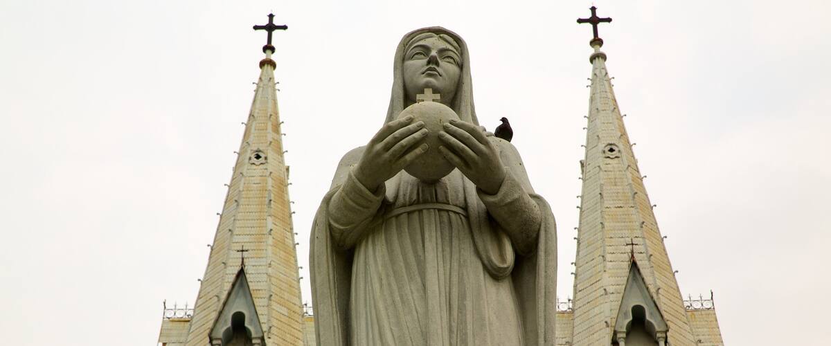 Ho Chi Minh City Notre Dame Cathedral featuring religious aspects, heritage architecture and a statue or sculpture