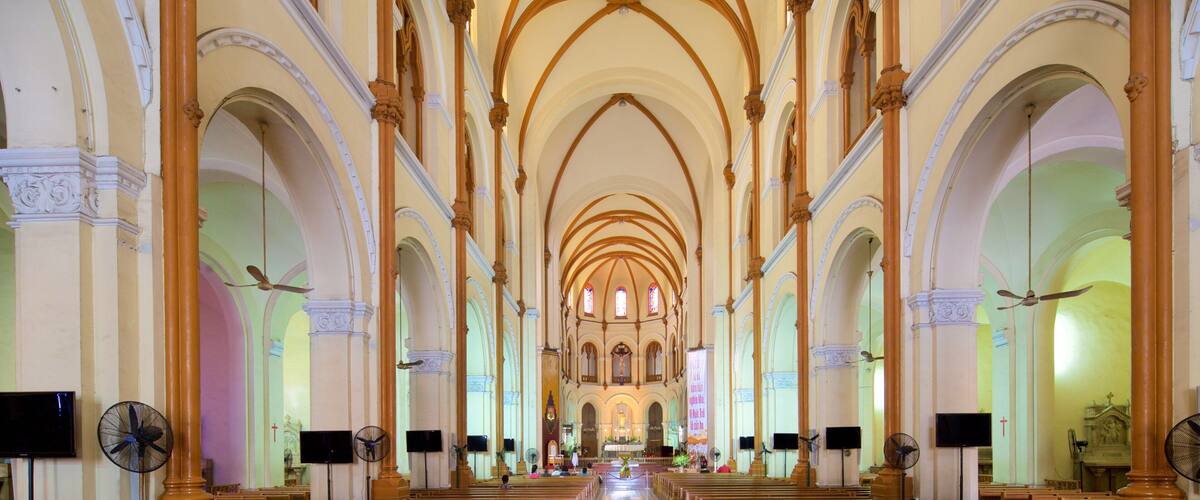 Saigon Notre-Dame Basilica featuring a church or cathedral, heritage architecture and interior views