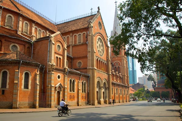 Saigon Notre-Dame Basilica which includes heritage architecture, a church or cathedral and street scenes