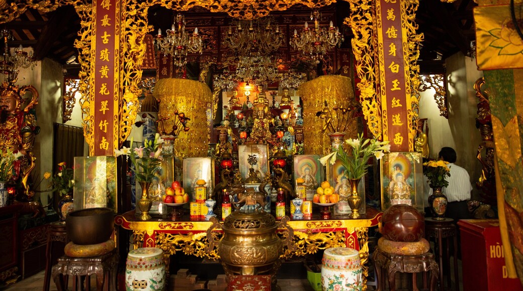 Ho Chi Minh Museum which includes heritage elements, interior views and a temple or place of worship