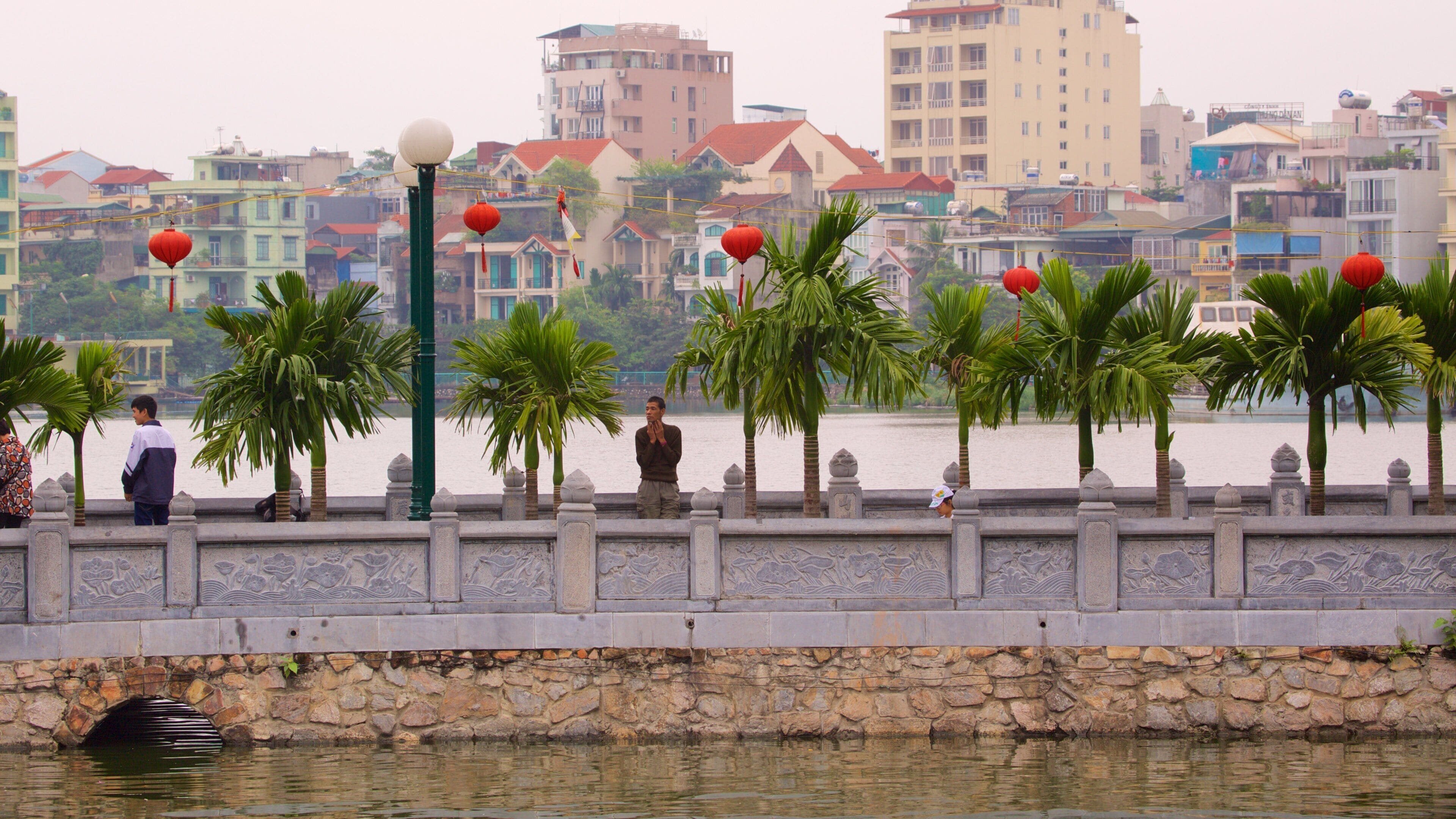 Tran Quoc Pagoda which includes a temple or place of worship and a city
