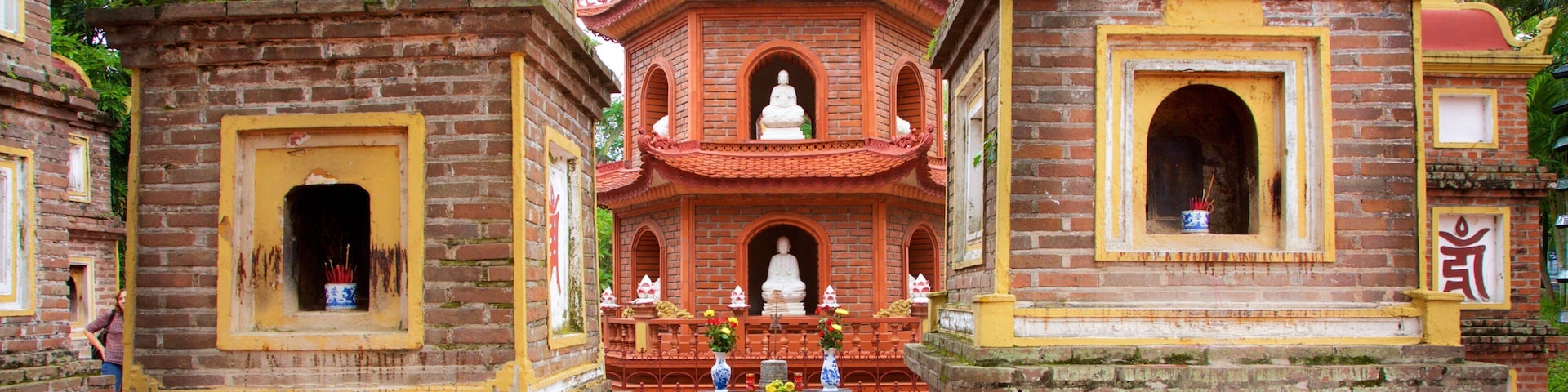 Tran Quoc Pagoda showing a temple or place of worship and religious aspects