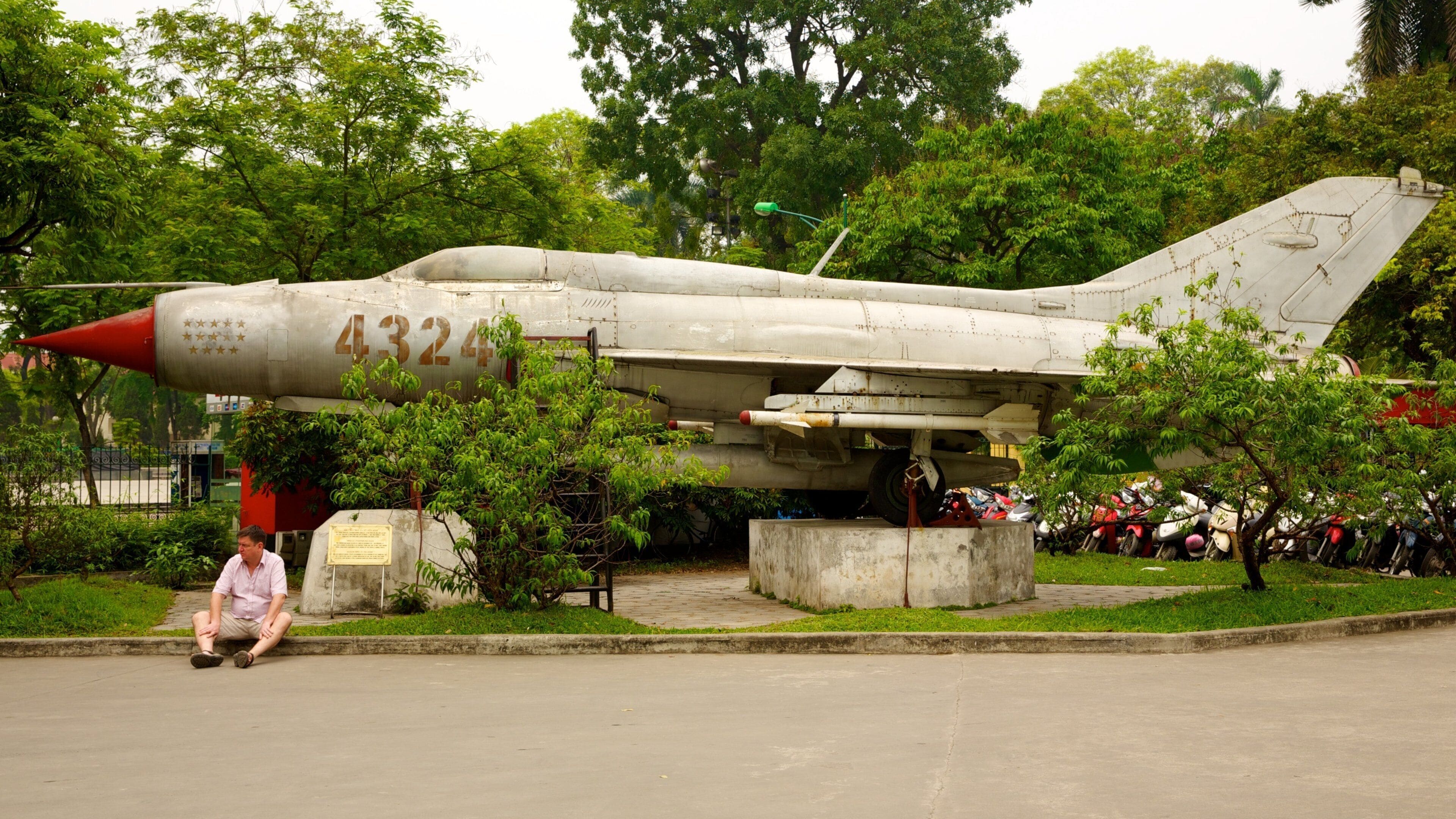 Hanoi War Museum which includes military items and aircraft as well as an individual male