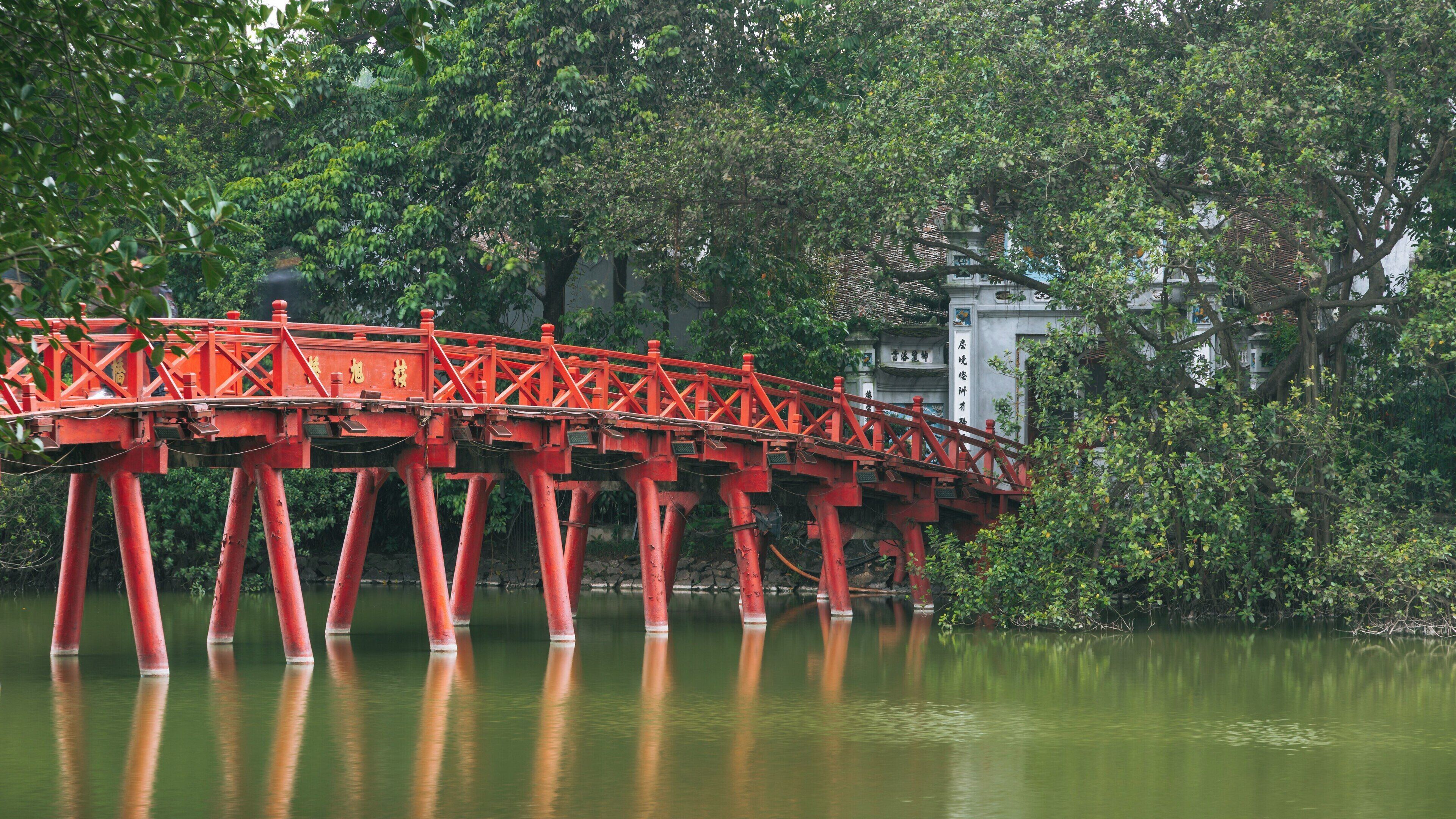 Historic Ngoc Son Temple located on a small island in Hoan Kiem Lake, Hanoi during a peaceful afternoon
