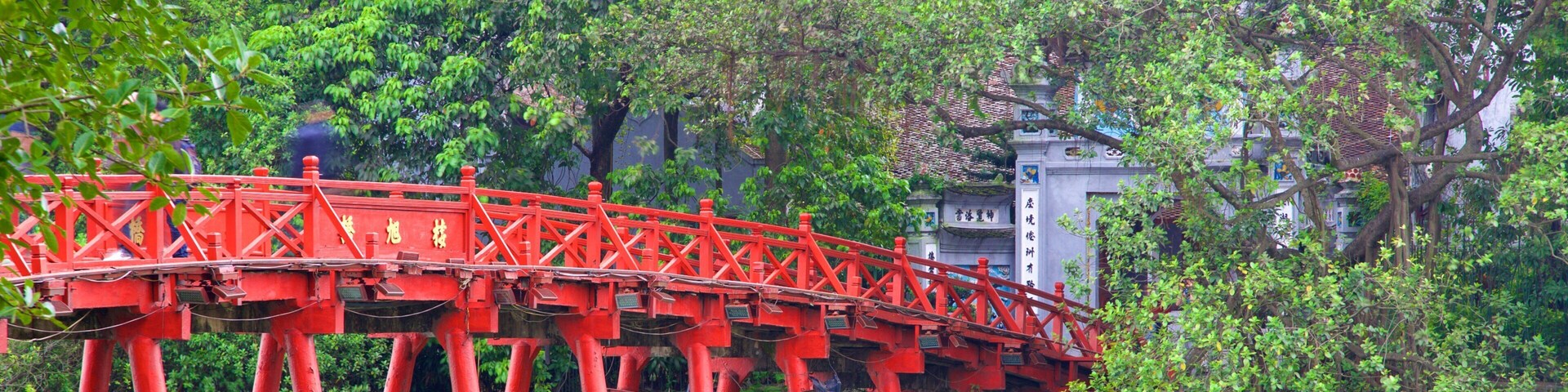 Ngoc Son Temple showing a lake or waterhole and a bridge