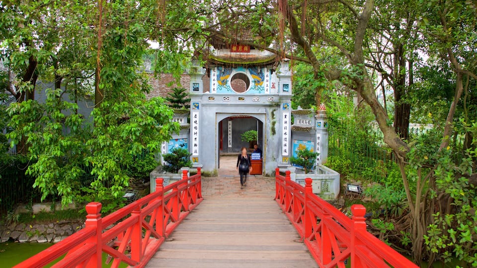 Ngoc Son Temple which includes a bridge as well as an individual female