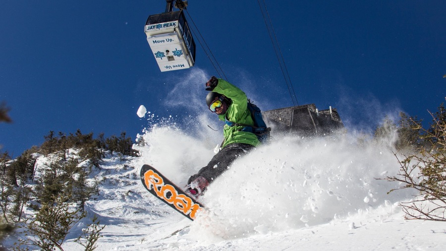 Jay Peak Ski Resort featuring snow, a gondola and snowboarding