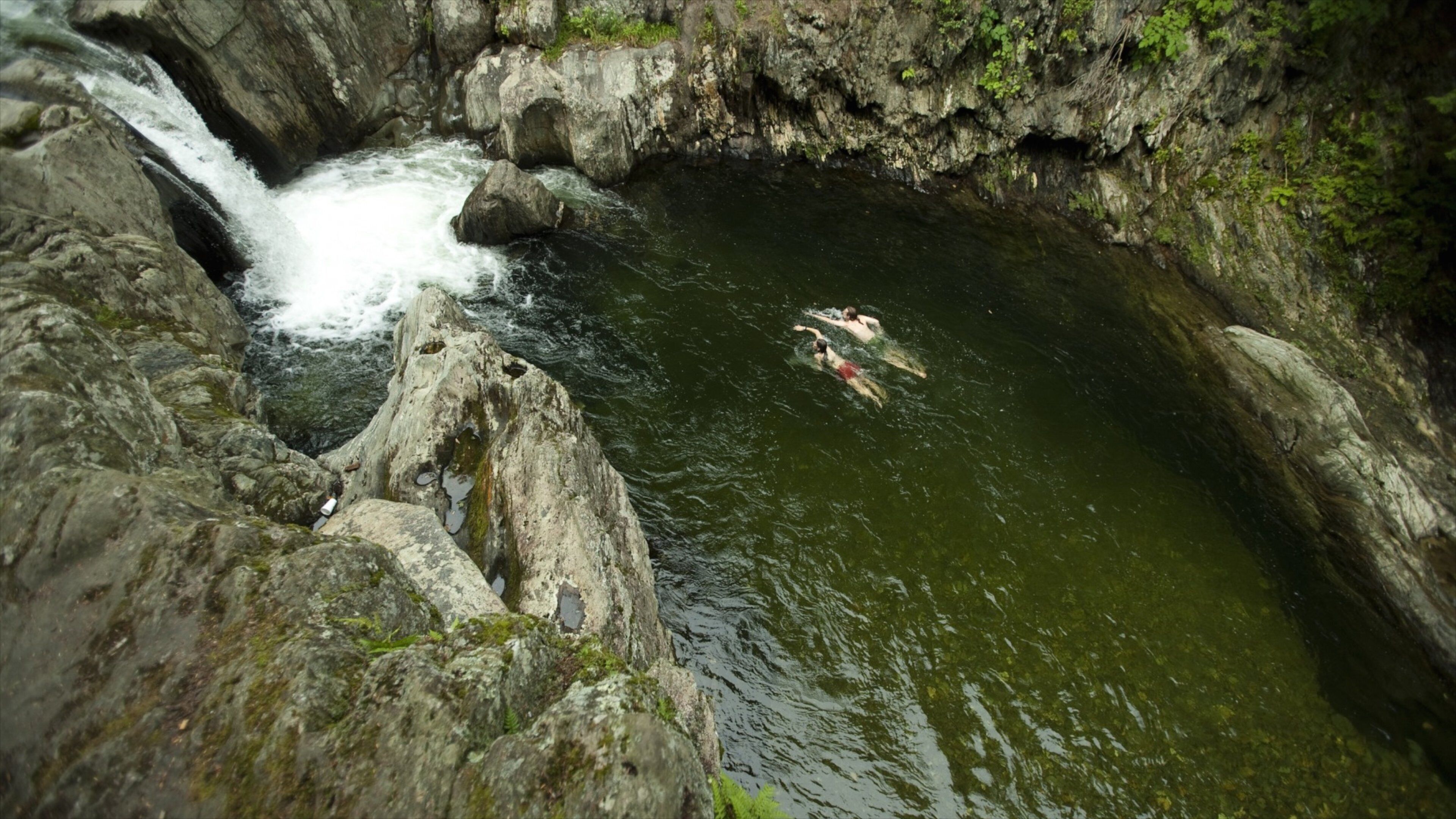 Jay Peak Ski Resort featuring a river or creek, a waterfall and swimming