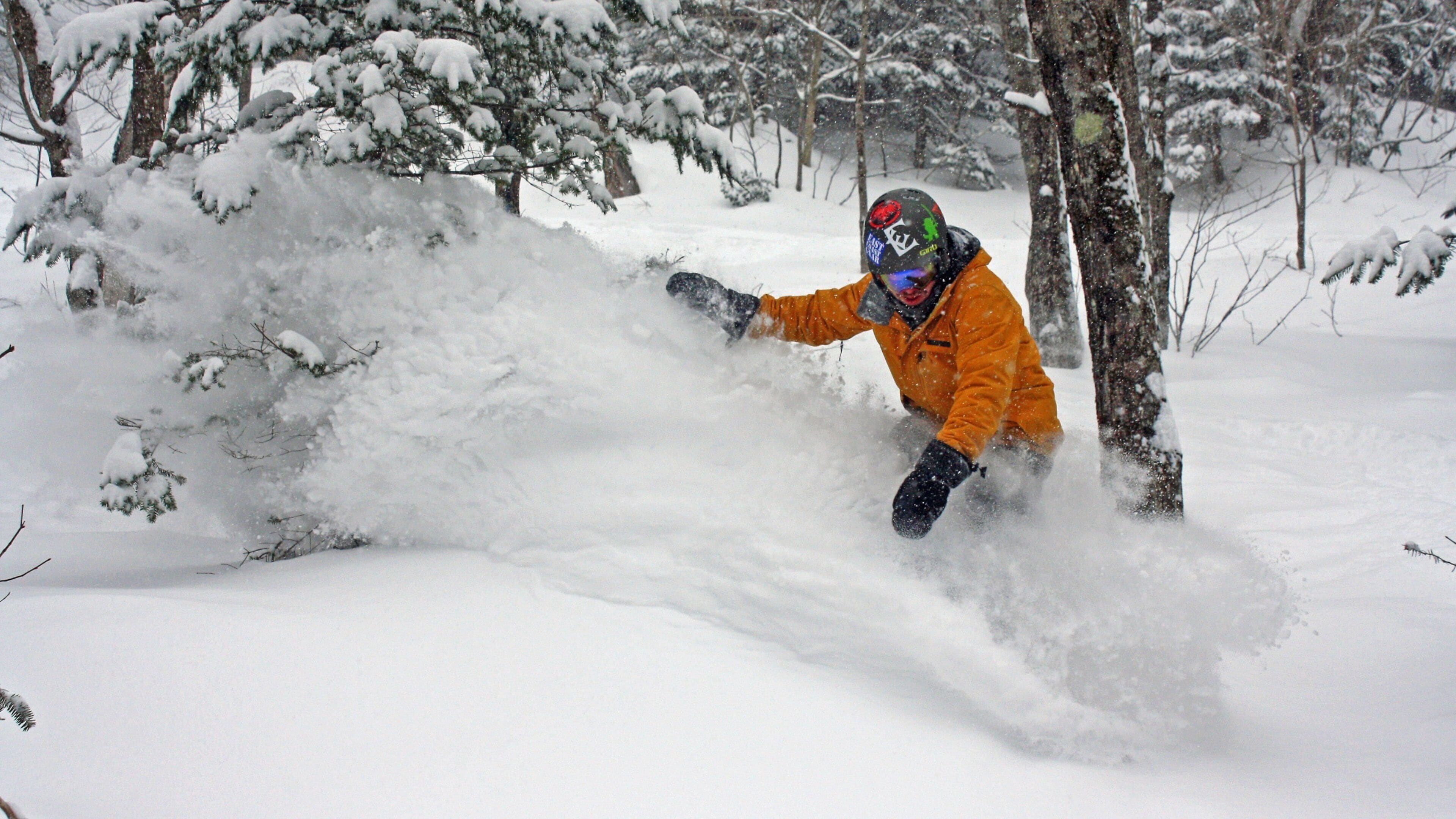 Stowe Mountain Resort featuring snow and snow boarding as well as an individual male