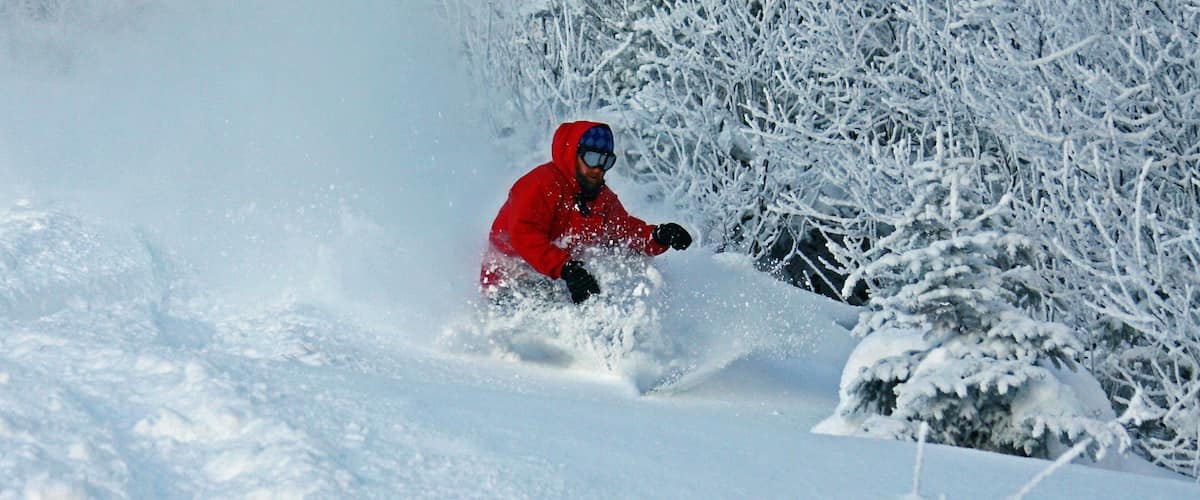 Stowe Mountain Resort joka esittää lunta sekä yksi mies